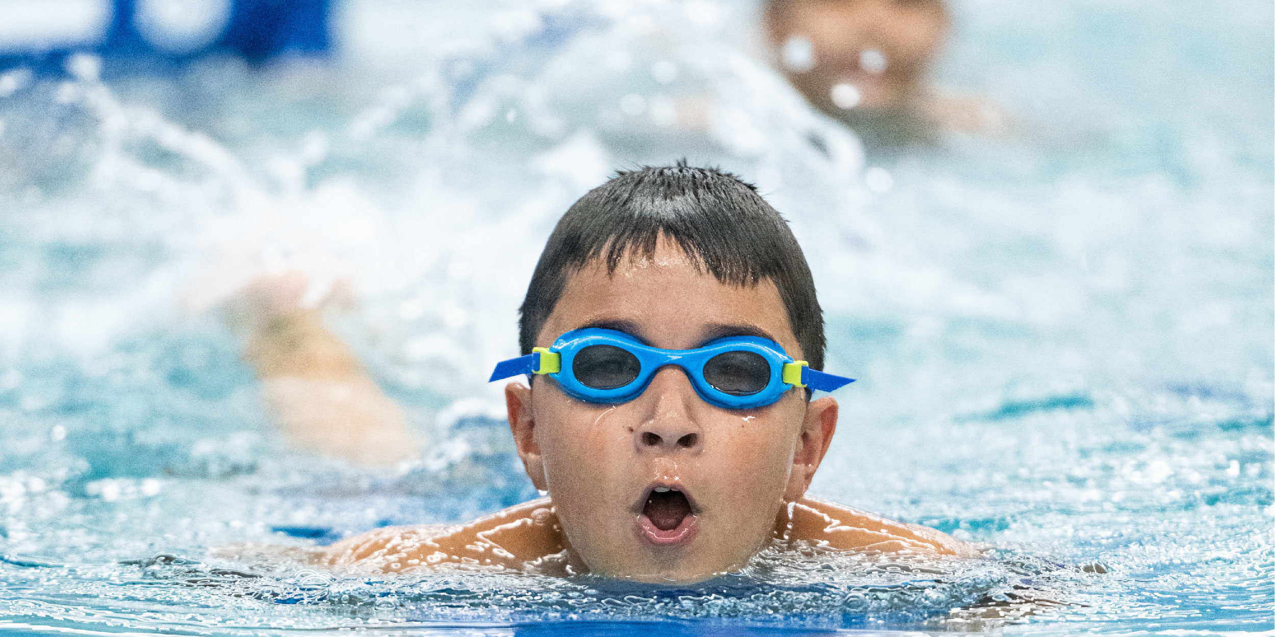 boy-wearing-googles-swimming-breast-stroke-at-pedalheads