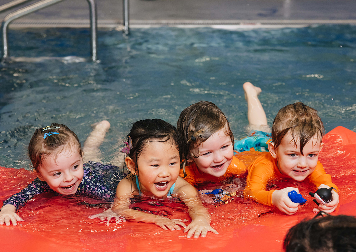 Kids having fun while learning to swim at Pedalheads